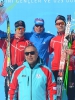 Фото на память: Сергей Устюгов с норвежскими лыжниками и организатором соревнований
